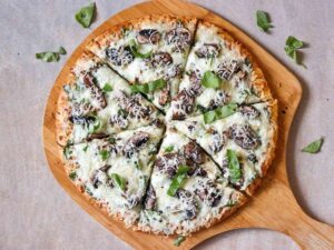 Як приготувати ідеальну піцу з грибами вдома?